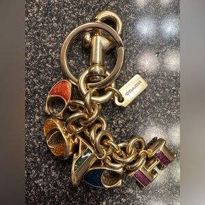 Coach Gold Keychain with Multicolor Charms